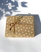 Beautifully wrapped soap gift box in kraft paper with twine and dried flowers